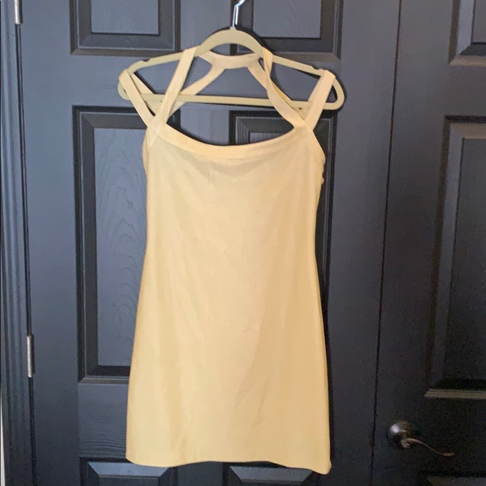 Cocktail dress with straps around arms and neck
